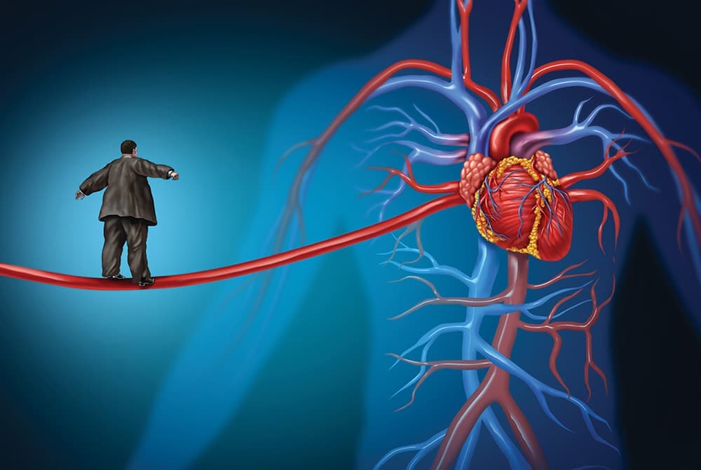 diabetes heart health man walking tightrope heart